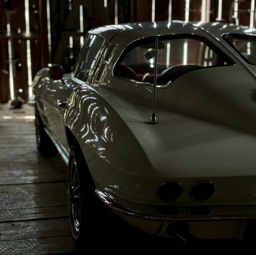 White Corvette in the barn